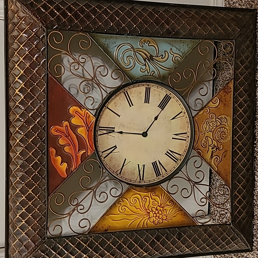 Beautiful bronze looking metal art frame with clock